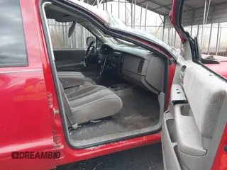 2002 Dodge Dakota Sport with VIN 1B7HG38N52S510495, listed as a IAAI auction lot 41694757 with 254,713 mi miles. Bid and sale history available at carsss.com. Image 5.
