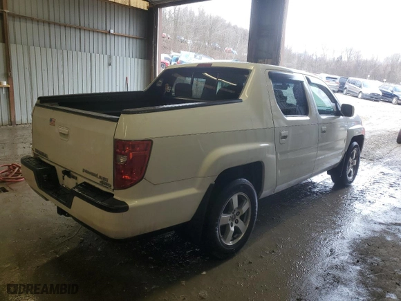 2010 Honda Ridgeline RTL with VIN 5FPYK1F57AB502049, listed as a Copart auction lot 87058684 with 228,156 mi miles and Clean Title. Bid and sale history available at carsss.com. Image 3.