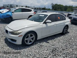 2013 BMW 3 Series 328i with VIN WBA3A5G53DNP24618, listed as a Copart auction lot 61731845 with 207,434 mi miles and Salvage title. Bid and sale history available at DreamBid. Image 1.