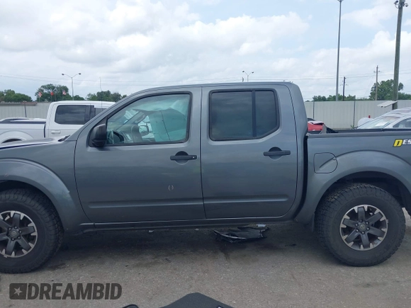 2016 Nissan Frontier SV z VIN 1N6AD0ER0GN763193, wystawiony jako IAAI lot #42137941 z przebiegiem 118 660 mil mil oraz . Historia ofert i sprzedaży dostępna na DreamBid. Obrazek 14.