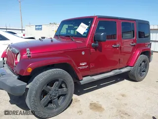 2011 Jeep Wrangler Unlimited Sahara with VIN 1J4BA5H15BL557871, listed as a IAAI auction lot 41922328 with 206,581 mi miles. Bid and sale history available at carsss.com. Image 18.