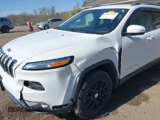 2015 Jeep Cherokee Latitude with VIN 1C4PJMCS0FW790017, listed as a IAAI auction lot 42097988 with 105,990 mi miles and . Bid and sale history available at DreamBid. Image 6.