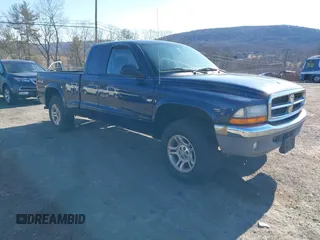 2004 Dodge Dakota SLT with VIN 1D7HG42N64S591353, listed as a IAAI auction lot 41714631 with 186,520 mi miles. Bid and sale history available at carsss.com. Image 1.