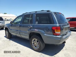 2004 Jeep Grand Cherokee Laredo z VIN 1J4GX48N54C371073, wystawiony jako Copart lot #52202855 z przebiegiem 212 368 mil mil oraz Szkoda całkowita • Salvage title. Historia ofert i sprzedaży dostępna na DreamBid. Obrazek 2.