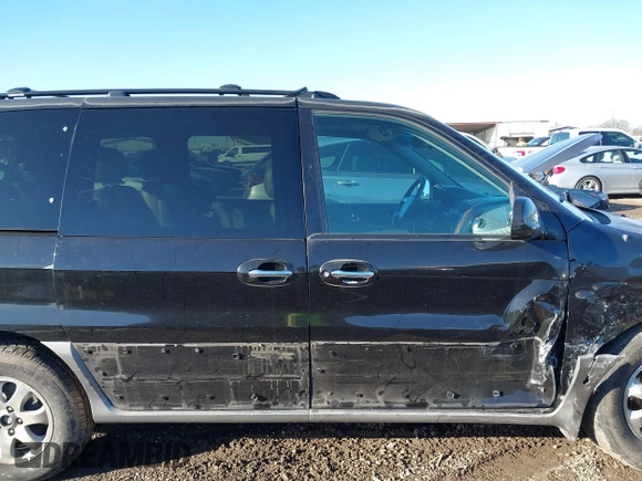 2004 Kia Sedona LX with VIN KNDUP131X46601278, listed as a IAAI auction lot 41472321 with 202,212 mi miles. Bid and sale history available at carsss.com. Image 14.