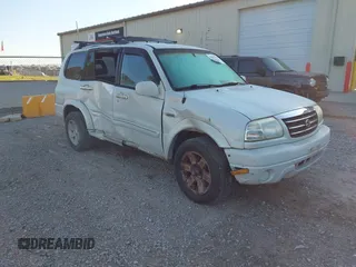 2002 Suzuki XL7 Standard z VIN JS3TX92VX24108435, wystawiony jako IAAI lot #42052096 z przebiegiem 234 430 mil mil oraz . Historia ofert i sprzedaży dostępna na DreamBid. Obrazek 1.