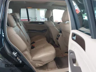 2014 Mercedes-Benz GL 450 z VIN 4JGDF7CE7EA435479, wystawiony jako IAAI lot #42280243 z przebiegiem 138 930 mil mil oraz . Historia ofert i sprzedaży dostępna na DreamBid. Obrazek 8.