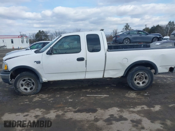 1999 Ford F-150 с VIN 1FTRX18W2XNB30523, выставлен на аукционе IAAI как лот 41617531 с пробегом 319 673 миль миль и . История ставок и продаж доступна на DreamBid. Изображение 14.