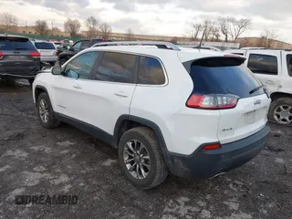 2019 Jeep Cherokee Latitude Plus with VIN 1C4PJMLX2KD254946, listed as a IAAI auction lot 41581777 with 49,748 mi miles. Bid and sale history available at carsss.com. Image 3.