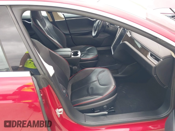 2014 Tesla Model S 60 with VIN 5YJSA1H17EFP30148, listed as a IAAI auction lot 39188024 with Not Provided miles and . Bid and sale history available at DreamBid. Image 5.