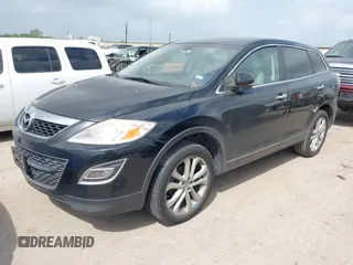 2011 Mazda CX-9 Grand Touring with VIN JM3TB2DA7B0304023, listed as a IAAI auction lot 41950829 with 135,858 mi miles. Bid and sale history available at carsss.com. Image 2.