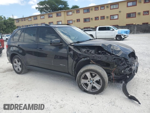 2013 BMW X5 xDrive35i z VIN 5UXZV4C58D0B21356, wystawiony jako Copart lot #54872375 z przebiegiem 113 825 mil mil oraz Szkoda całkowita • Salvage title. Historia ofert i sprzedaży dostępna na DreamBid. Obrazek 4.