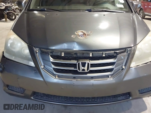 2010 Honda Odyssey EX-L with VIN 5FNRL3H78AB030111, listed as a IAAI auction lot 41250121 with 333,030 mi miles and . Bid and sale history available at DreamBid. Image 14.