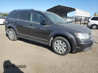 2016 Dodge Journey SE with VIN 3C4PDCABXGT103296, listed as a Copart auction lot 56358715 with 106,821 mi miles and Clean Title. Bid and sale history available at DreamBid. Image 4.