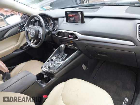 2019 Mazda CX-9 Touring with VIN JM3TCBCY6K0334898, listed as a IAAI auction lot 42467677 with 69,454 mi miles and . Bid and sale history available at DreamBid. Image 5.