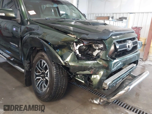 2012 Toyota Tacoma with VIN 3TMLU4EN2CM094154, listed as a IAAI auction lot 41322227 with 270,712 mi miles and . Bid and sale history available at DreamBid. Image 6.