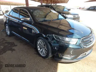 2015 Ford Taurus Limited with VIN 1FAHP2F8XFG135452, listed as a IAAI auction lot 42003510 with 71,476 mi miles. Bid and sale history available at carsss.com. Image 1.