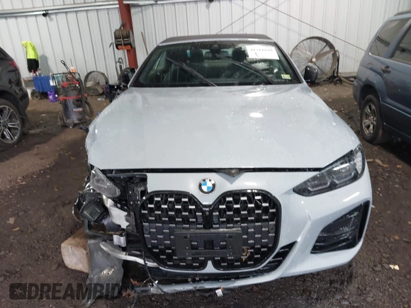 2024 BMW 4 Series 430i xDrive with VIN WBA43AT00RCN83317, listed as a IAAI auction lot 41211849 with 12,000 mi miles and . Bid and sale history available at DreamBid. Image 13.