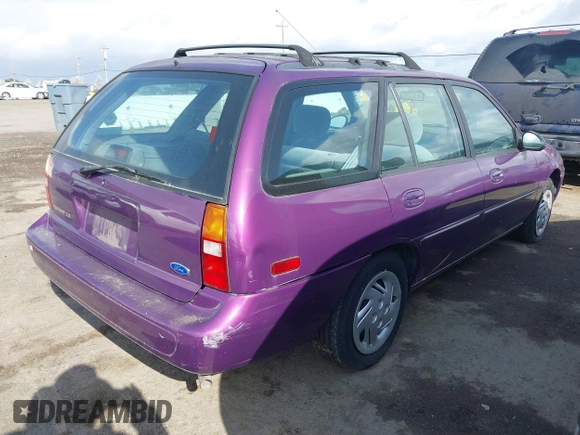 1997 Ford Escort LX with VIN 3FALP15P9VR137438, listed as a IAAI auction lot 41872987 with 134,606 mi miles. Bid and sale history available at carsss.com. Image 4.