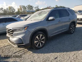 2024 Honda Pilot Touring z VIN 5FNYG2H70RB015463, wystawiony jako Copart lot #73832964 z przebiegiem 14 606 mil mil oraz Szkoda całkowita • Salvage title. Historia ofert i sprzedaży dostępna na DreamBid. Obrazek 1.