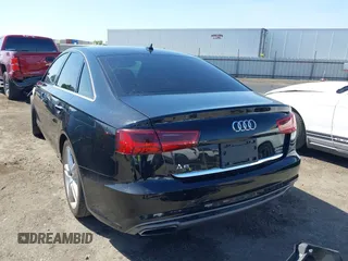 2016 Audi A6 Premium Plus z VIN WAUGFAFC0GN122291, wystawiony jako IAAI lot #42212208 z przebiegiem 106 970 mil mil oraz . Historia ofert i sprzedaży dostępna na DreamBid. Obrazek 3.