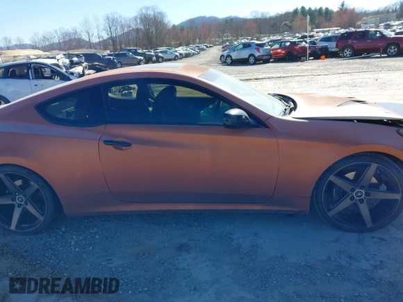2013 Hyundai Genesis Coupe Premium z VIN KMHHT6KD3DU080563, wystawiony jako IAAI lot #41803798 z przebiegiem 173 692 mil mil oraz . Historia ofert i sprzedaży dostępna na DreamBid. Obrazek 14.