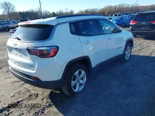 2020 Jeep Compass Latitude with VIN 3C4NJDBB2LT115599, listed as a IAAI auction lot 40970548 with 63,349 mi miles. Bid and sale history available at carsss.com. Image 4.