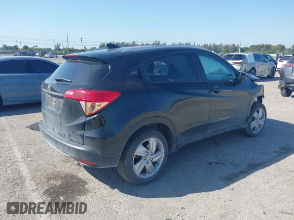 2019 Honda HR-V EX with VIN 3CZRU5H57KM711018, listed as a IAAI auction lot 41804535 with 72,096 mi miles. Bid and sale history available at carsss.com. Image 4.