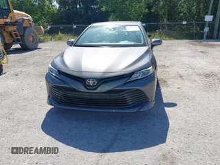 2019 Toyota Camry LE with VIN 4T1B11HK4KU286959, listed as a IAAI auction lot 42063344 with 92,481 mi miles and . Bid and sale history available at DreamBid. Image 12.