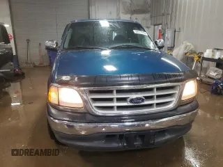 1999 Ford F-150 z VIN 1FTRF17W6XNB72620, wystawiony jako Copart lot #50977015 z przebiegiem Nie podano mil oraz Szkoda całkowita • Salvage title. Historia ofert i sprzedaży dostępna na DreamBid. Obrazek 5.