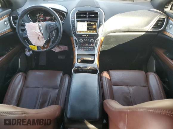 2016 Lincoln MKX Reserve z VIN 2LMPJ6LP7GBL54002, wystawiony jako Copart lot #48757875 z przebiegiem 128 008 mil mil oraz Szkoda całkowita • Salvage title. Historia ofert i sprzedaży dostępna na DreamBid. Obrazek 8.