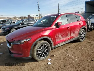 2018 Mazda CX-5 Grand Touring with VIN JM3KFBDM3J0375051, listed as a Copart auction lot 45989125 with 77,147 mi miles and Salvage Title. Bid and sale history available at carsss.com. Image 1.