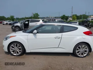 2012 Hyundai Veloster w/Gray Int with VIN KMHTC6AD3CU051395, listed as a IAAI auction lot 42489038 with 153,319 mi miles and . Bid and sale history available at DreamBid. Image 6.