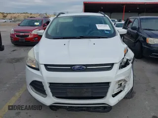 2015 Ford Escape SE with VIN 1FMCU0GX2FUB33893, listed as a IAAI auction lot 41455605 with 128,383 mi miles. Bid and sale history available at carsss.com. Image 12.