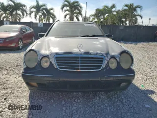 2001 Mercedes-Benz E-Class AWD with VIN WDBJH82J91X053532, listed as a Copart auction lot 82387664 with 116,737 mi miles and Salvage Title. Bid and sale history available at carsss.com. Image 5.