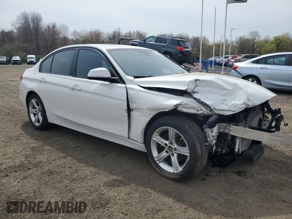 2015 BMW 3 Series 328i xDrive with VIN WBA3B5C53FF960590, listed as a Copart auction lot 54687145 with 54,520 mi miles and Salvage title. Bid and sale history available at DreamBid. Image 4.
