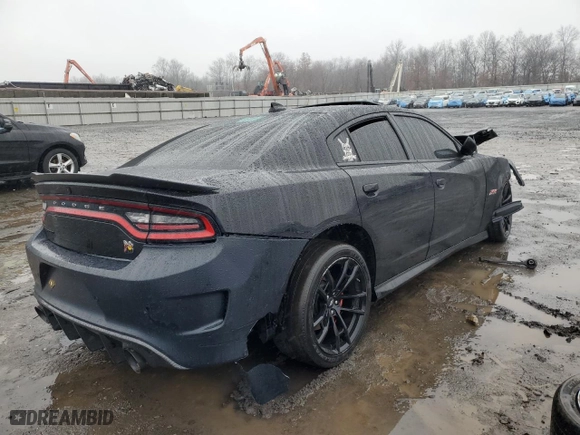 2021 Dodge Charger Scat Pack with VIN 2C3CDXGJ9MH658933, listed as a Copart auction lot 84810294 with 44,633 mi miles and Salvage Title. Bid and sale history available at carsss.com. Image 3.
