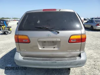 1999 Toyota Sienna CE z VIN 4T3ZF19C4XU163765, wystawiony jako Copart lot #54405805 z przebiegiem Nie podano mil oraz Szkody całkowita. Historia ofert i sprzedaży dostępna na DreamBid. Obrazek 6.