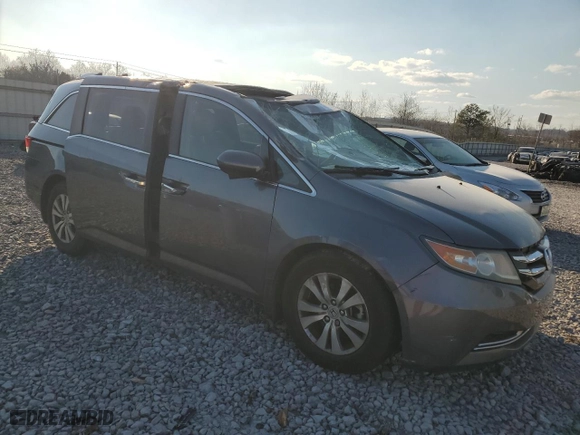 2014 Honda Odyssey EX-L with VIN 5FNRL5H63EB007568, listed as a Copart auction lot 46528515 with 184,430 mi miles and Salvage Title. Bid and sale history available at carsss.com. Image 4.