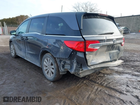 2018 Honda Odyssey LX with VIN 5FNRL6H27JB095795, listed as a IAAI auction lot 41780386 with 99,318 mi miles. Bid and sale history available at carsss.com. Image 3.