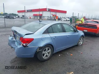 2014 Chevrolet Cruze 1LT with VIN 1G1PC5SBXE7373362, listed as a IAAI auction lot 42341145 with 232,056 mi miles and . Bid and sale history available at DreamBid. Image 4.