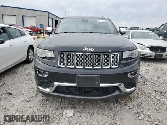 2014 Jeep Grand Cherokee Summit with VIN 1C4RJFJG1EC323658, listed as a Copart auction lot 50740115 with 253,656 mi miles and Salvage title. Bid and sale history available at DreamBid. Image 5.