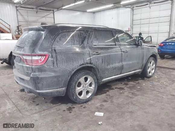 2014 Dodge Durango Limited with VIN 1C4RDJDG5EC977844, listed as a IAAI auction lot 41558932 with 133,703 mi miles. Bid and sale history available at carsss.com. Image 4.