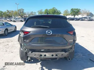 2018 Mazda CX-5 Grand Touring with VIN JM3KFBDM8J0314925, listed as a IAAI auction lot 41825917 with 70,027 mi miles. Bid and sale history available at carsss.com. Image 17.