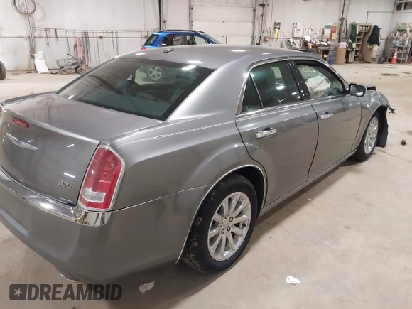 2012 Chrysler 300 Limited with VIN 2C3CCACG3CH173700, listed as a IAAI auction lot 41803306 with 90,924 mi miles. Bid and sale history available at carsss.com. Image 4.