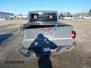 2022 Jeep Gladiator High Altitude with VIN 1C6HJTFGXNL124571, listed as a IAAI auction lot 41272140 with 14,198 mi miles and . Bid and sale history available at DreamBid. Image 17.