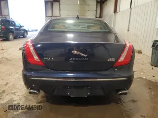 2014 Jaguar XJ Portfolio with VIN SAJWJ2GD7E8V67473, listed as a Copart auction lot 43968705 with 99,146 mi miles and Salvage title. Bid and sale history available at DreamBid. Image 6.