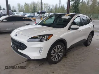 2020 Ford Escape Titanium Hybrid z VIN 1FMCU9DZ8LUA58350, wystawiony jako IAAI lot #41975564 z przebiegiem 38 387 mil mil oraz . Historia ofert i sprzedaży dostępna na DreamBid. Obrazek 17.