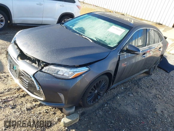 2016 Toyota Avalon Limited with VIN 4T1BK1EBXGU205973, listed as a IAAI auction lot 41206815 with 64,169 mi miles and . Bid and sale history available at DreamBid. Image 2.