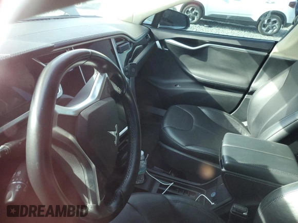 2014 Tesla Model S 60 with VIN 5YJSA1H1XEFP32590, listed as a Copart auction lot 64424145 with Not provided miles and Clean title. Bid and sale history available at DreamBid. Image 9.